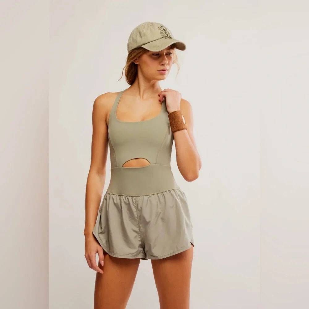 new Free People righteous runsie active romper in sage stone green